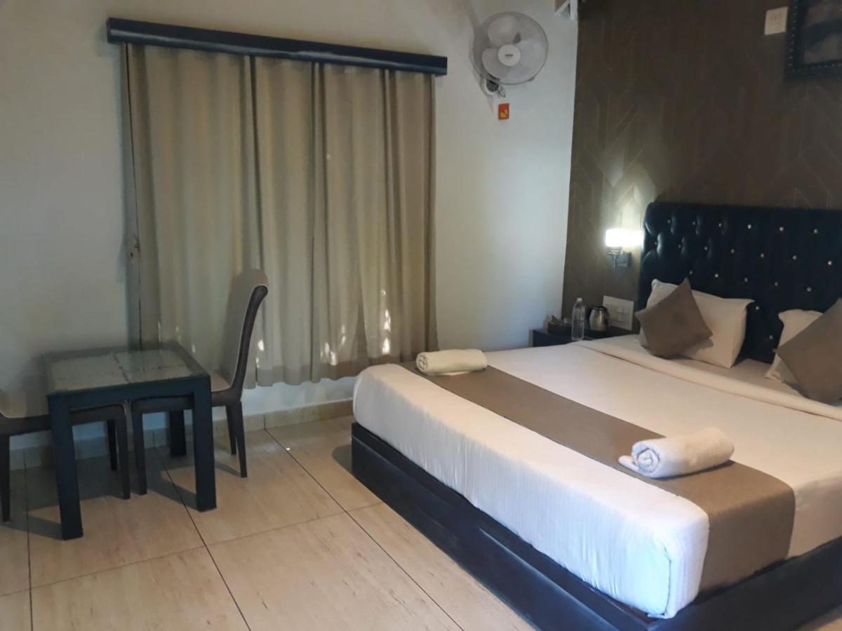 Misty Rain Estate Hotel Мадикери Екстериор снимка